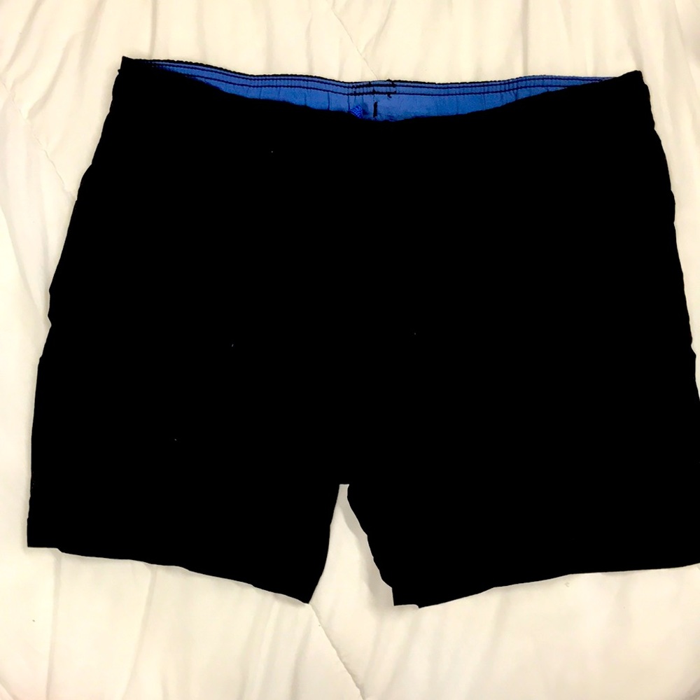 Black swim trunks.